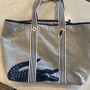 Lacoste tote large grey with matching pouch(attachment is broke but still zips)